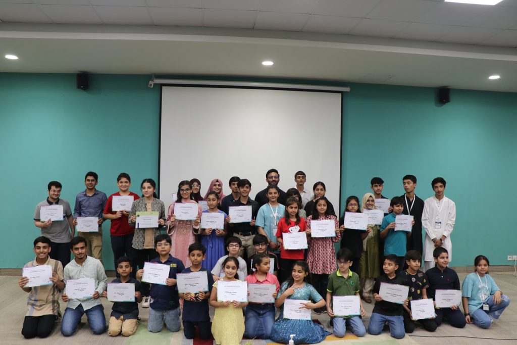 Young Entrepreneurs in Pakistan that graduated from the summer programme posing with their certificates